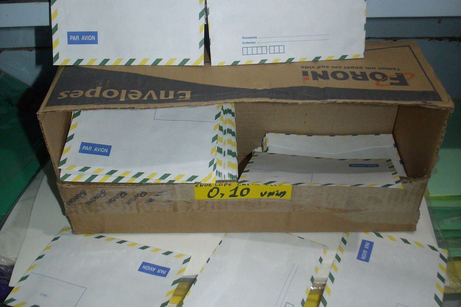 Box of Brazilian airmail envelopes marked PAR AVION with green and yellow borders