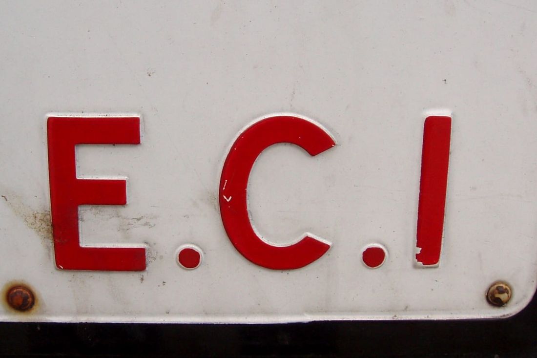 Old London street sign with the postal district E.C.1 in red letters